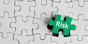 Puzzle pieces with word 'Risk’.